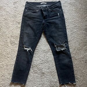 Distressed Black Levi’s